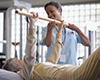 Physical therapist working with a patient in a clinic