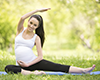 Pregnant woman stretching