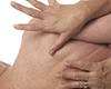 Close up of hands massaging someone's back