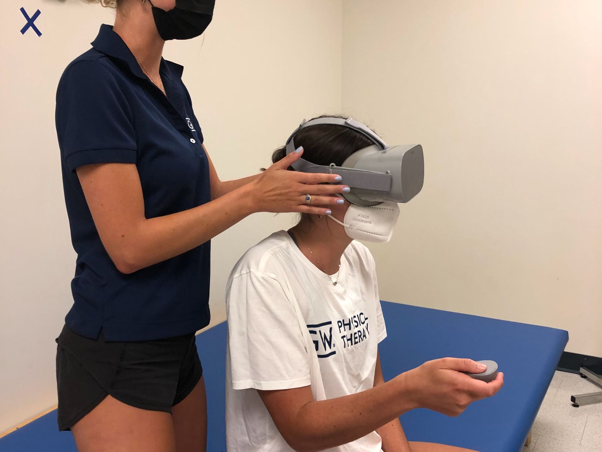 Student research assistants demonstrating use of a virtual reality headset